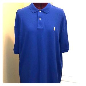 black polo shirt with gold horse